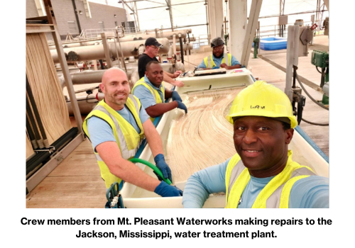 Crew members from Mt. Pleasant Waterworks making repairs to the Jackson, Mississippi, water treatment plant. 