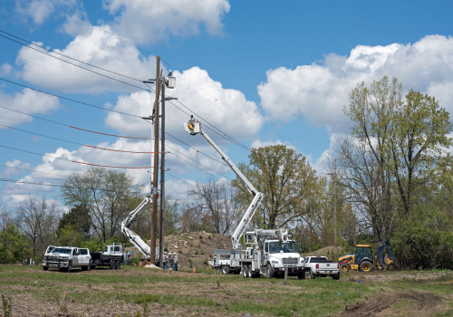 Electrical crew begin work on replacing old electrical utility pole with a new one.