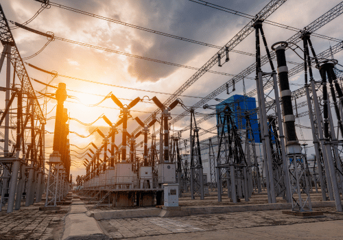 High voltage substation under sunset