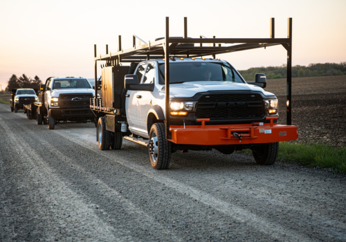 Fleet of utility trucks jobsite