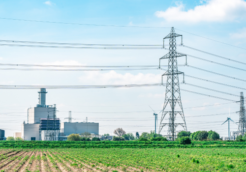 Electric high voltage tower with electric line near Keadby Power Station, England, UK