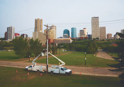 Altec bucket trucks on jobsite working on powerlines