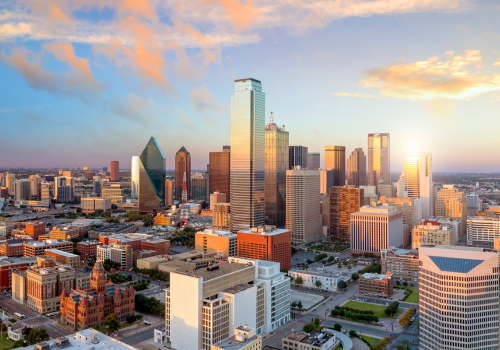 Dallas, Texas cityscape with blue sky at sunset, Texas