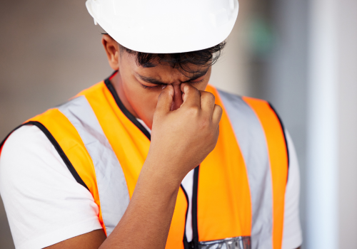 Utility worker headache stressed