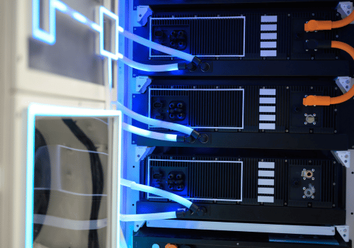 close view of high-end server rack with liquid cooling, used in data centers for artificial intelligence, cloud storage, and tech infrastructure environments.