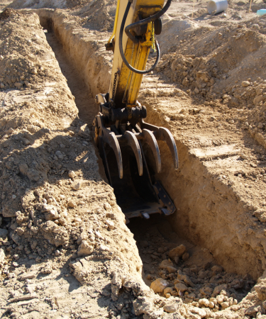 close up of digging a trench
