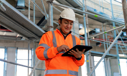 Construction Worker on a Tablet